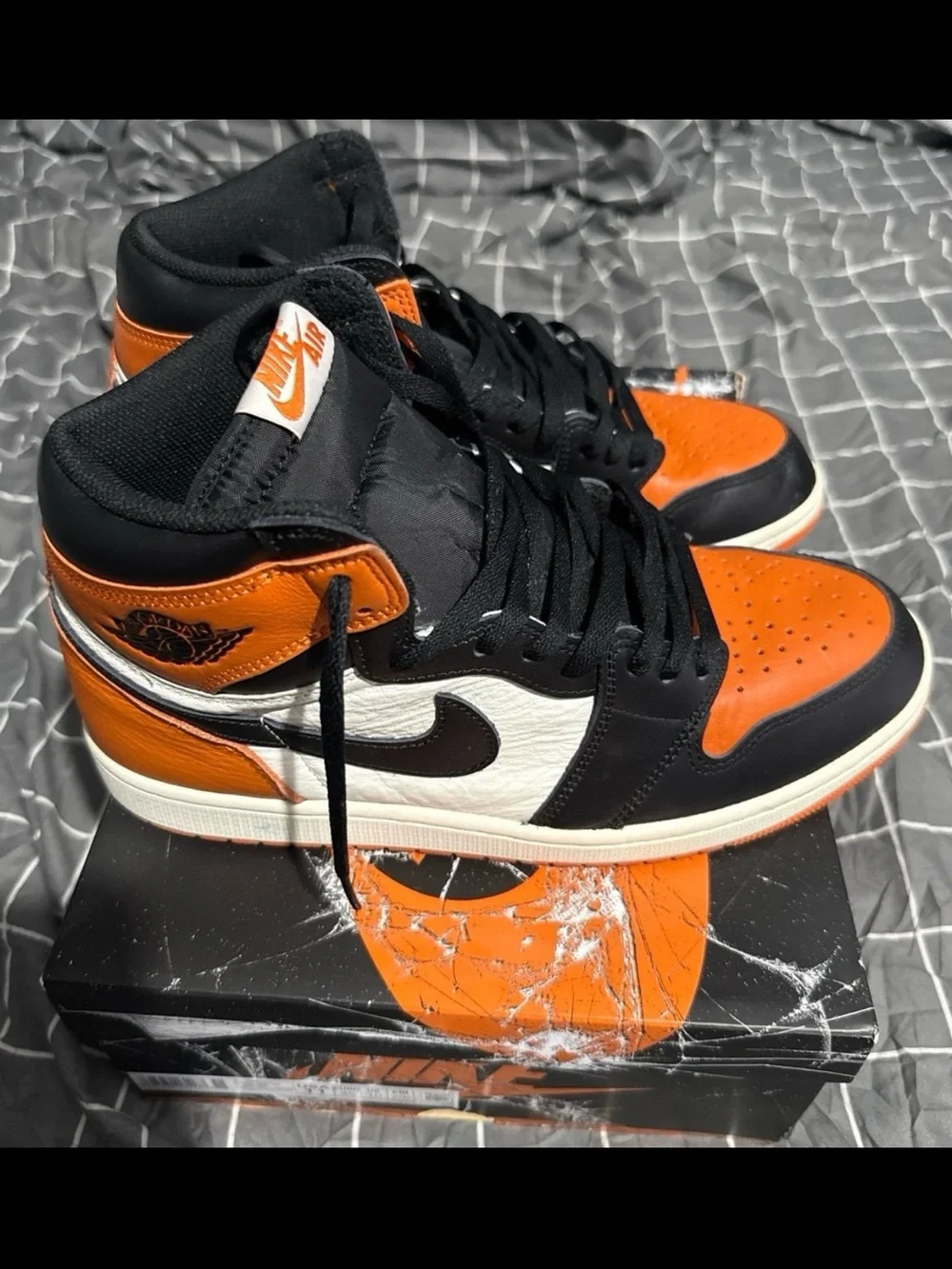Nike Men’s Black and Orange High-Top Sneakers